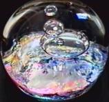 Wild Foxfire World paperweight by Rebecca Stewart